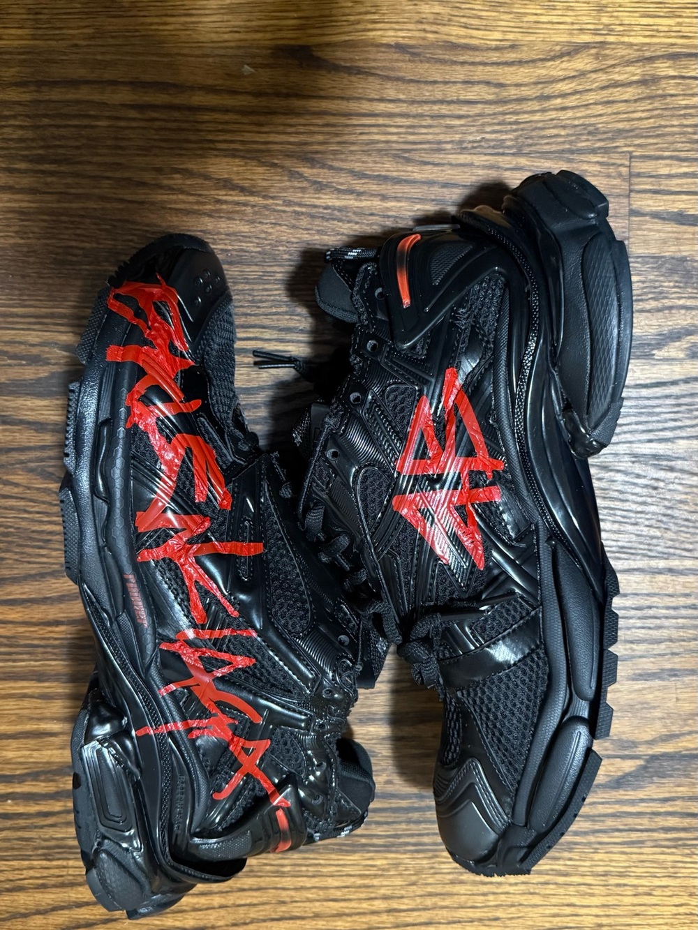 Balenciaga Black Sneakers with Red Graphic Accents